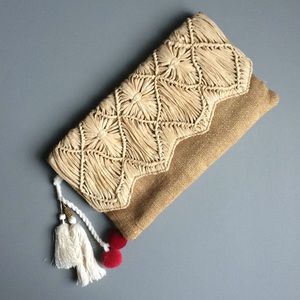 OYSHO // straw and canvas clutch with red pompons